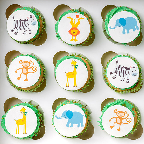 Jungle photo cupcakes, with images of a Cheeky Monkey, A Tall Giraffe, I bouncing Zebra, A Happy Elephant and Dancing Lion.