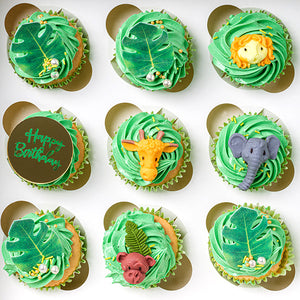 Our luxury Safari Cupcakes include a collection of wild animals including a gentle giraffe, a friendly elephant, and a speedy lion and a cheeky monkey. Topped with edible wafer leaves and a non edible Happy Birthday Plaque